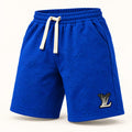 Polo Lacoste azul con detalles naranjas